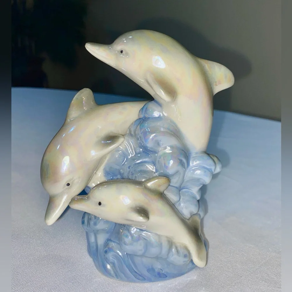 Glazed Ceramic Dolphin Trio on a blue Wave